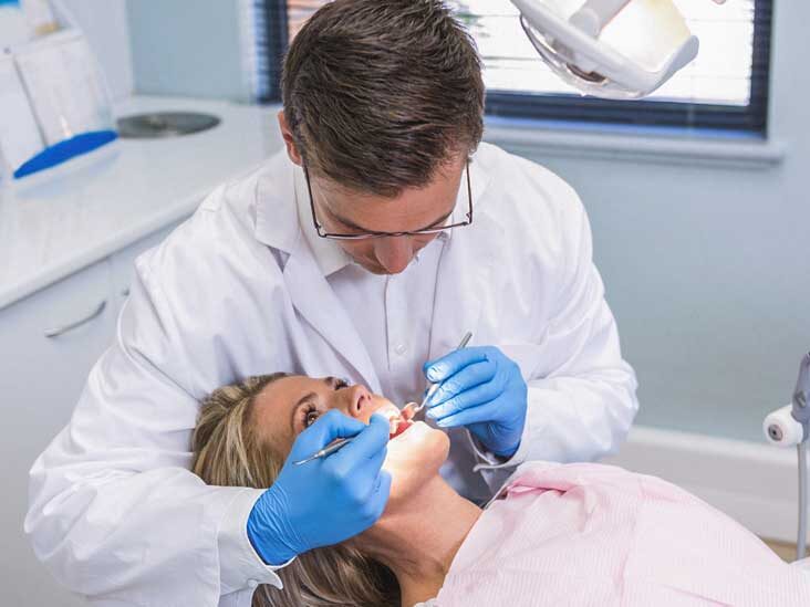 High angle view of dentist examining woman with dental equipments at medical clinic
855914964
dental hygiene, clinic, 30s, female, 20s, male, head and shoulders